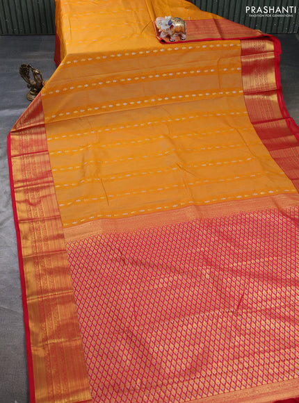 Semi kanchipuram silk saree mango yellow and red with allover zari weaves & buttas and zari woven border