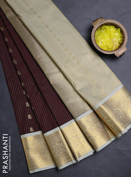 Semi kanchipuram silk saree coffee brown and mild pista green with allover zari weaves & buttas and zari woven border