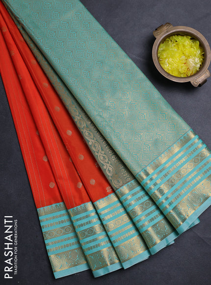 Semi kanchipuram silk saree orange and teal blue with allover zari woven buttas and zari woven border
