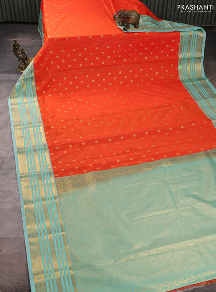 Semi kanchipuram silk saree orange and teal blue with allover zari woven buttas and zari woven border