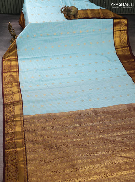 Semi kanchipuram silk saree teal blue and deep maroon with allover zari checks & buttas and zari woven border