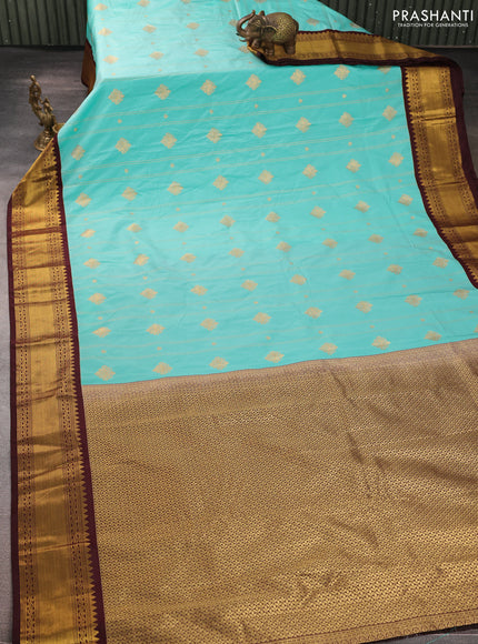Semi kanchipuram silk saree teal blue and coffee brown with allover zari weaves & buttas and zari woven border