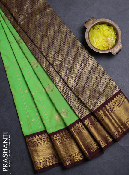 Semi kanchipuram silk saree light green and coffee brown with allover zari weaves & buttas and zari woven border