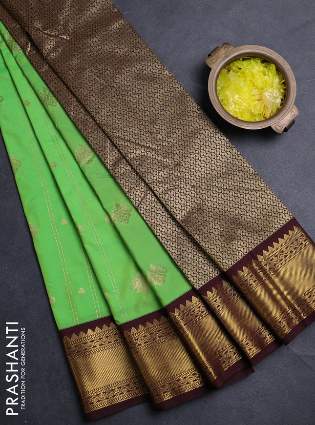 Semi kanchipuram silk saree light green and coffee brown with allover zari weaves & buttas and zari woven border