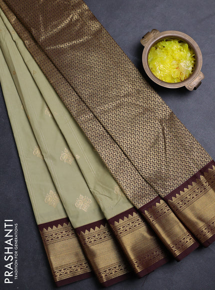 Semi kanchipuram silk saree pista green and coffee brown with allover zari weaves & buttas and rettapet zari woven border