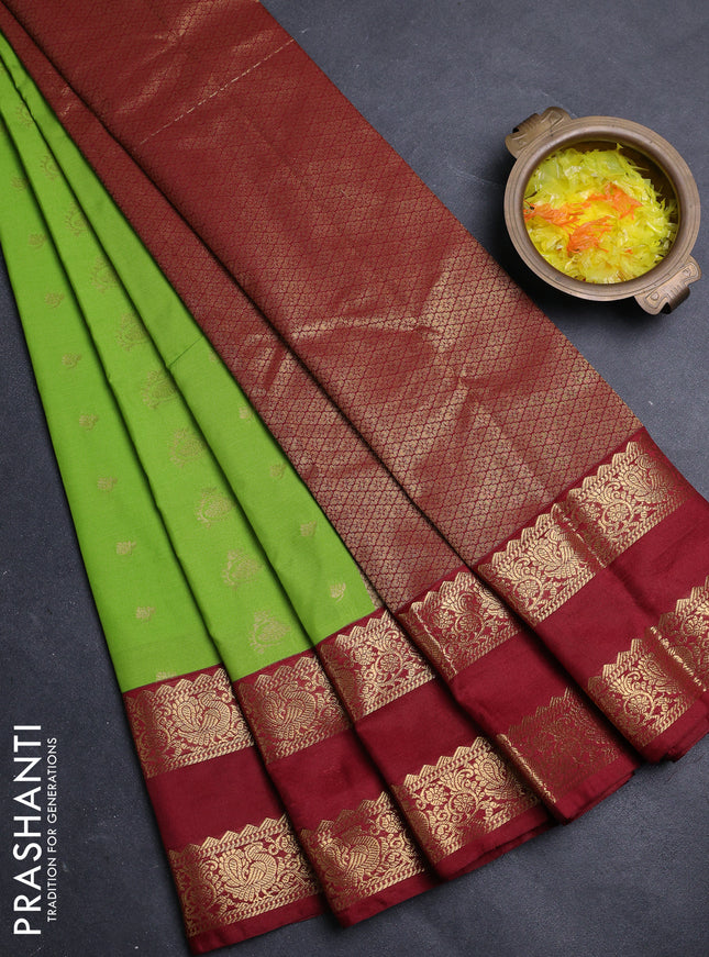 Semi kanchipuram silk saree light green and maroon with allover zari woven buttas and rettapet zari woven border