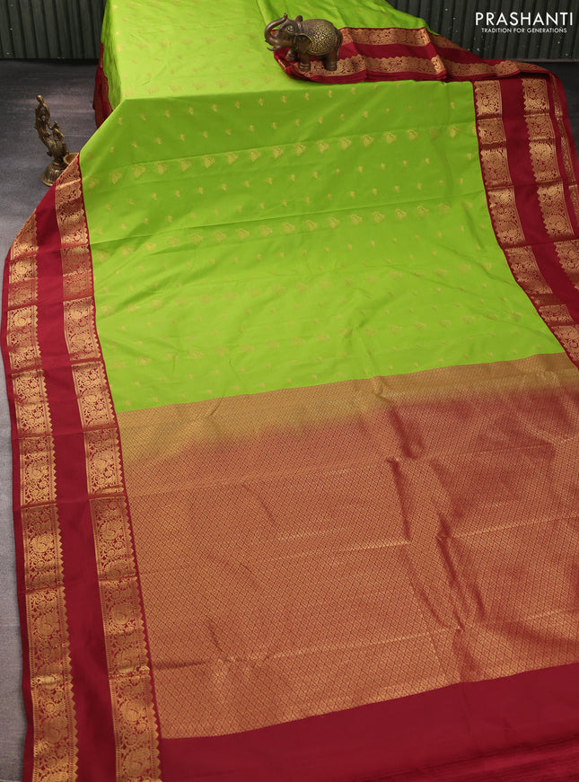 Semi kanchipuram silk saree light green and maroon with allover zari woven buttas and rettapet zari woven border