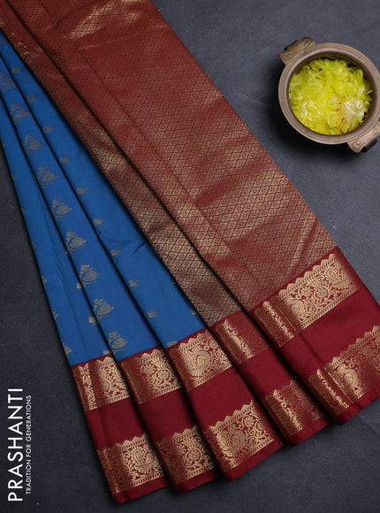 Semi kanchipuram silk saree peacock blue and deep maroon with allover zari woven buttas and rettapet zari woven border