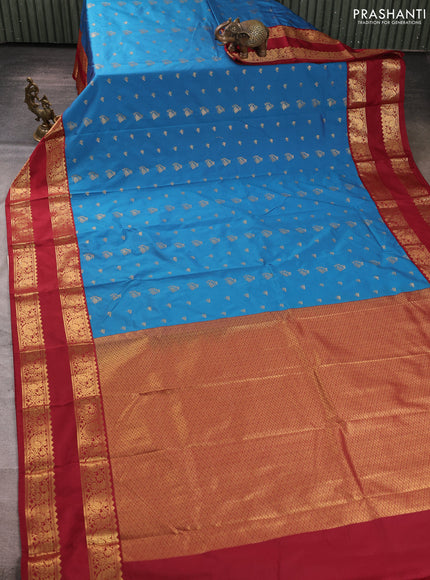 Semi kanchipuram silk saree peacock blue and deep maroon with allover zari woven buttas and rettapet zari woven border
