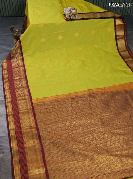 Semi kanchipuram silk saree light green and deep maroon with allover zari weaves & buttas and long zari woven korvai border