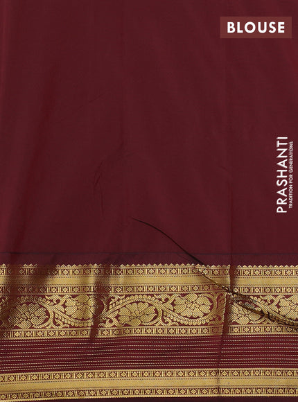 Semi kanchipuram silk saree yellow and deep maroon with allover zari weaves & buttas and long zari woven korvai border