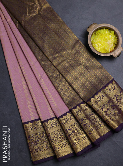Semi kanchipuram silk saree pastel pink and deep purple with allover zari weaves & buttas and zari woven korvai border