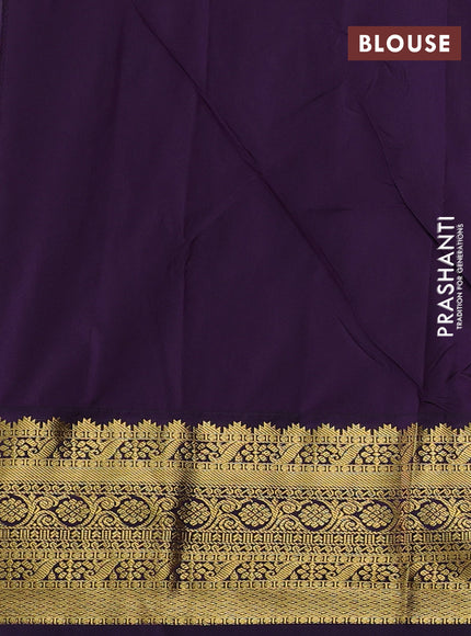 Semi kanchipuram silk saree light green and deep purple with allover zari woven buttas and zari woven korvai border