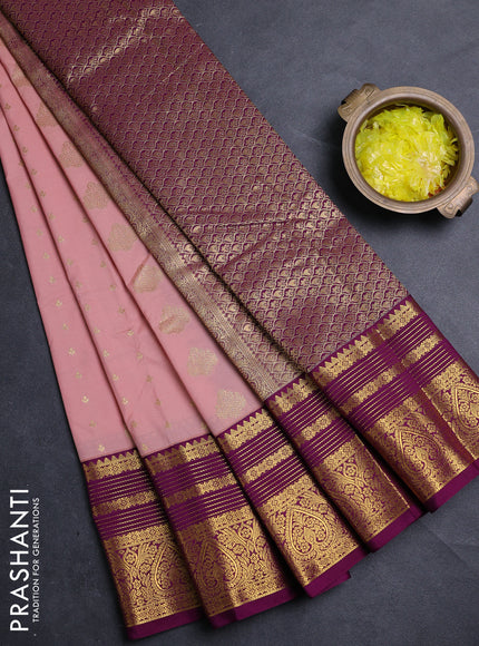 Semi kanchipuram silk saree pastel pink and purple with allover zari woven buttas and zari woven korvai border