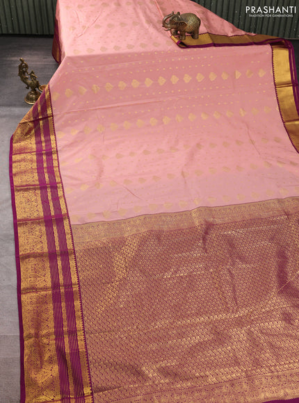 Semi kanchipuram silk saree pastel pink and purple with allover zari woven buttas and zari woven korvai border