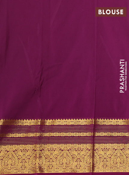 Semi kanchipuram silk saree light green and purple with allover zari woven buttas and zari woven korvai border