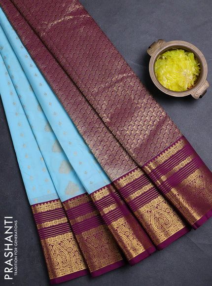Semi kanchipuram silk saree teal blue and purple with allover zari woven buttas and zari woven korvai border