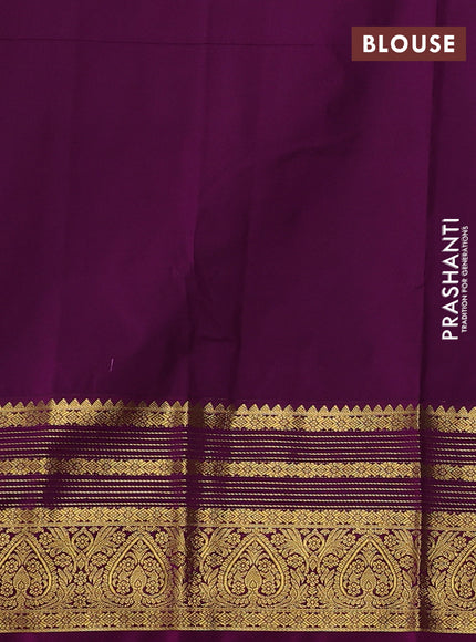 Semi kanchipuram silk saree teal blue and purple with allover zari woven buttas and zari woven korvai border