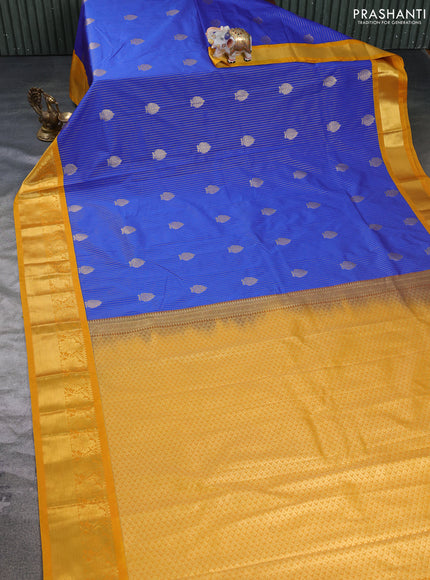Semi kanchipuram silk saree blue and yellow with allover zari weaves & buttas and zari woven korvai border