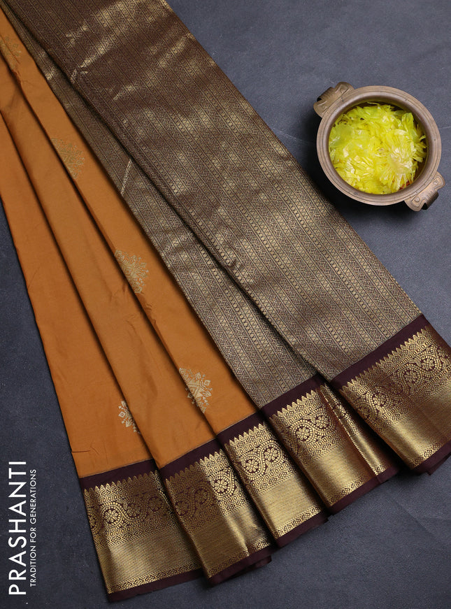 Semi kanchipuram silk saree mustard yellow and coffee brown with zari woven buttas and zari woven korvai border