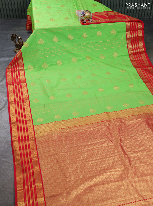 Semi kanchipuram silk saree lime green and red with allover zari weaves & buttas and zari woven korvai border
