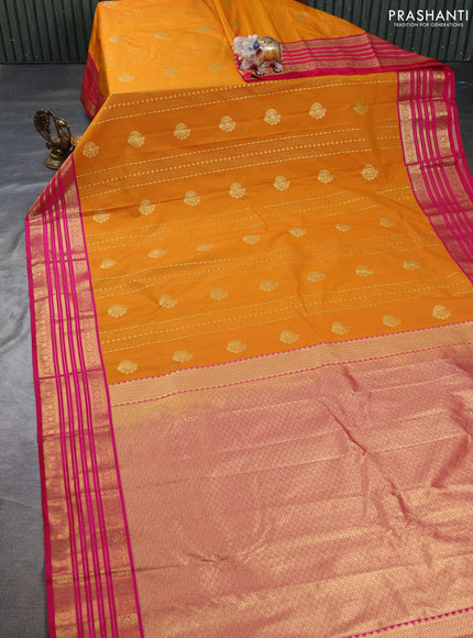 Semi kanchipuram silk saree mustard yellow and pink with allover zari weaves & buttas and zari woven korvai border