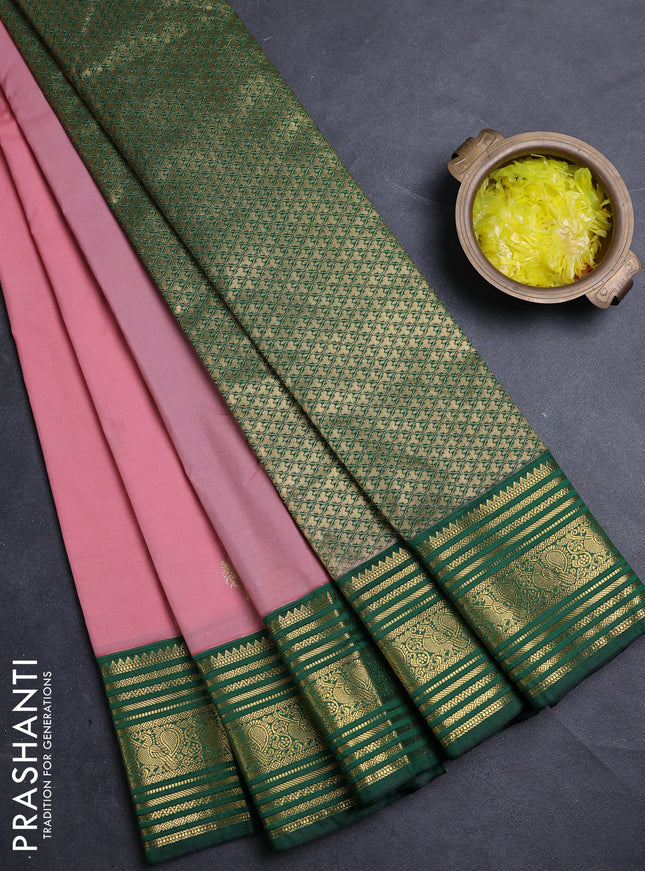 Semi kanchipuram silk saree pastel pink and green with zari woven buttas and zari woven korvai border