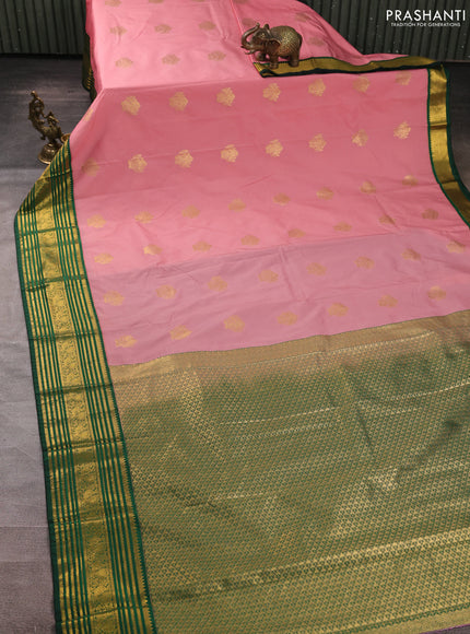 Semi kanchipuram silk saree pastel pink and green with zari woven buttas and zari woven korvai border
