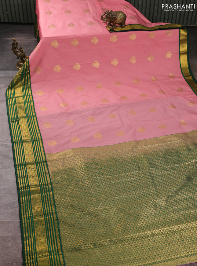 Semi kanchipuram silk saree pastel pink and green with zari woven buttas and zari woven korvai border