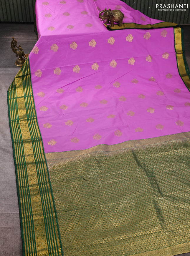 Semi kanchipuram silk saree lavender and green with zari woven buttas and zari woven korvai border