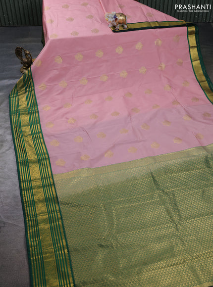 Semi kanchipuram silk saree pastel pink and green with zari woven buttas and zari woven korvai border