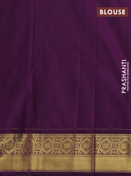 Semi kanchipuram silk saree light green and deep purple with allover zari woven buttas and zari woven border