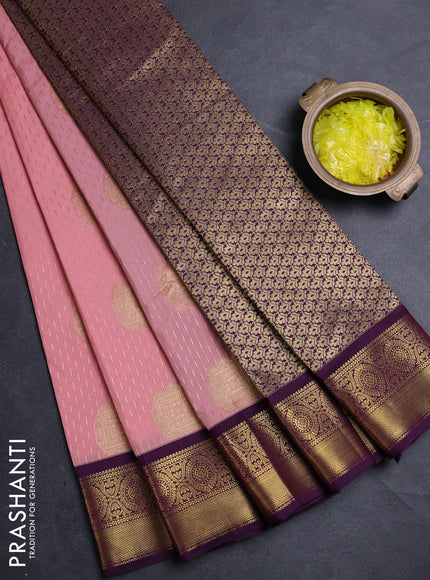 Semi kanchipuram silk saree peach pink and deep purple with allover zari woven buttas and zari woven border