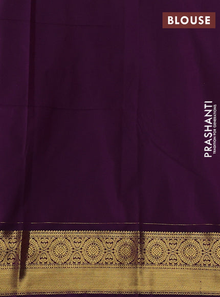Semi kanchipuram silk saree peach pink and deep purple with allover zari woven buttas and zari woven border