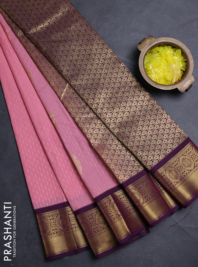 Semi kanchipuram silk saree peach pink and purple with allover zari woven buttas and zari woven border
