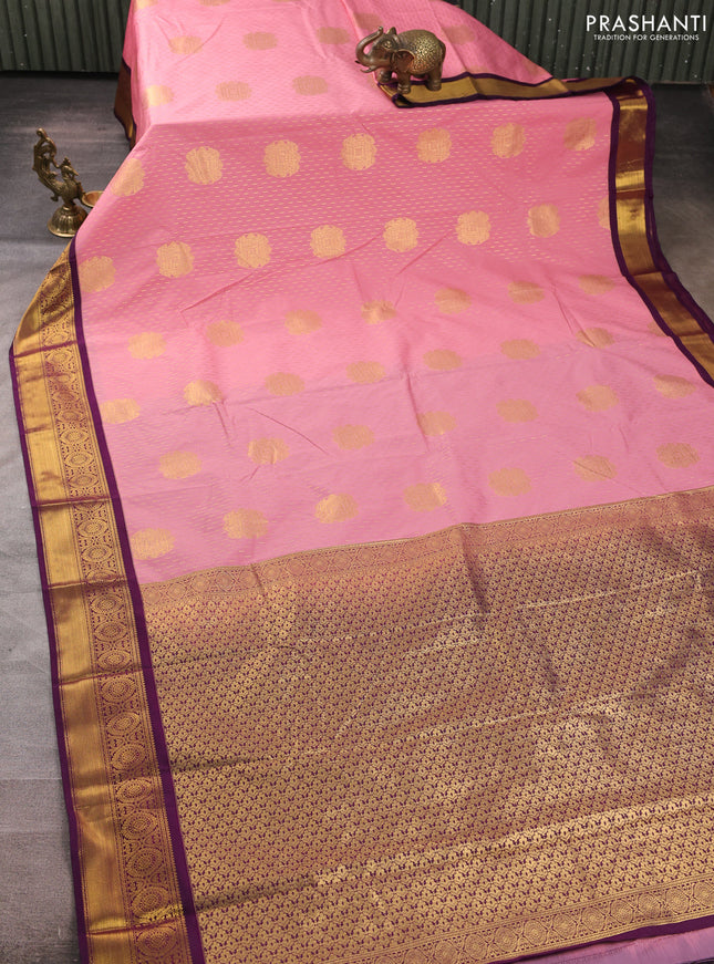 Semi kanchipuram silk saree peach pink and purple with allover zari woven buttas and zari woven border