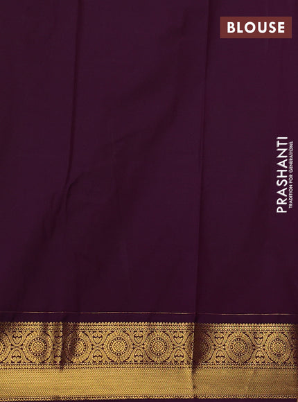 Semi kanchipuram silk saree light green and purple with allover zari woven buttas and zari woven border