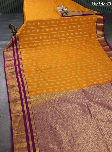 Semi kanchipuram silk saree mustard yellow and purple with allover zari weaves & buttas and long zari woven border