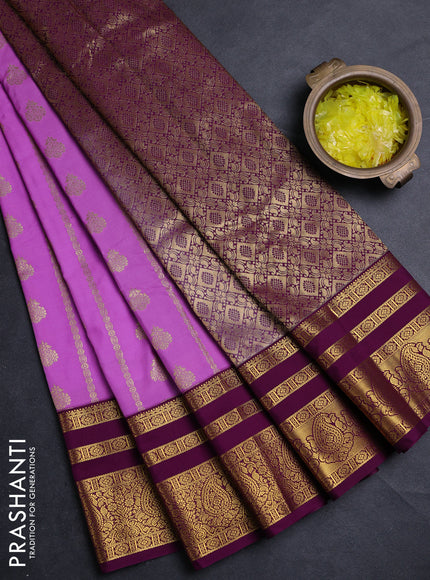 Semi kanchipuram silk saree lavender and purple with allover zari weaves & buttas and long zari woven border
