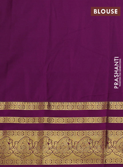 Semi kanchipuram silk saree teal blue and purple with allover zari woven buttas and long zari woven border