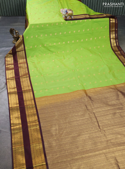 Semi kanchipuram silk saree light green and deep maroon with allover zari woven buttas and long rettapet zari woven border