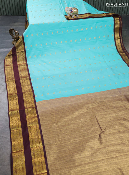 Semi kanchipuram silk saree teal blue and deep maroon with allover zari woven buttas and long rettapet zari woven border
