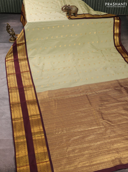 Semi kanchipuram silk saree pista green and deep maroon with zari woven buttas and long rettapet zari woven border