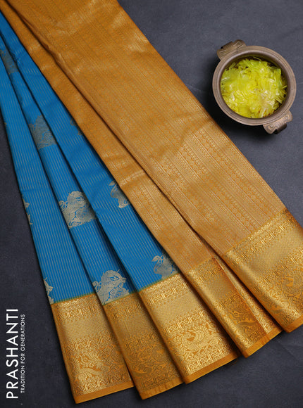 Semi kanchipuram silk saree cs blue and mustard yellow with allover zari weaves & buttas and zari woven border