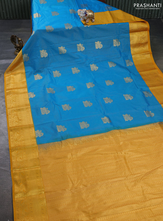 Semi kanchipuram silk saree cs blue and mustard yellow with allover zari weaves & buttas and zari woven border