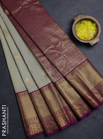 Semi kanchipuram silk saree pista green and purple with allover zari weaves & buttas and long zari woven border