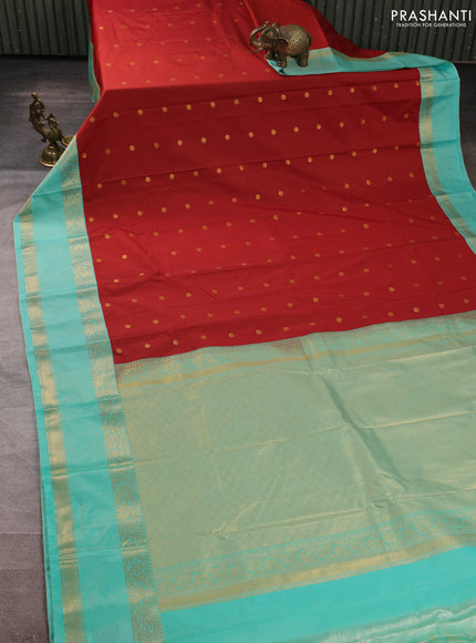 Semi kanchipuram silk saree maroon and teal green with allover zari woven buttas and zari woven korvai border