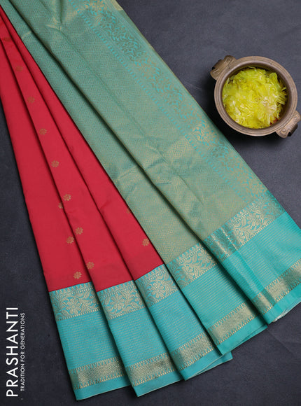 Semi kanchipuram silk saree tomato pink and teal green with allover zari woven buttas and zari woven korvai border