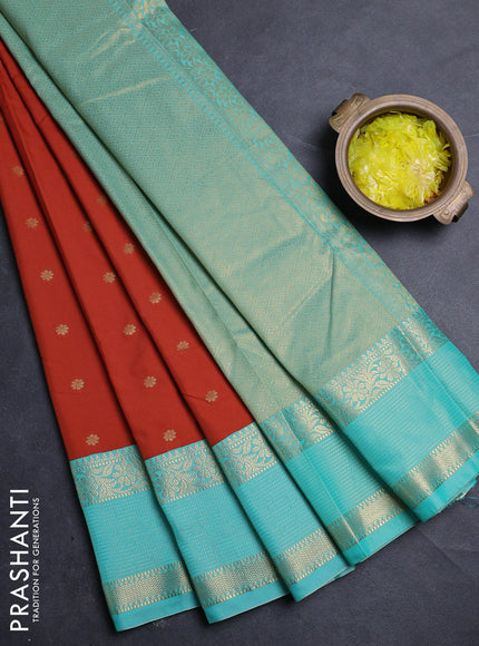 Semi kanchipuram silk saree rust shade and teal green with allover zari woven buttas and zari woven border