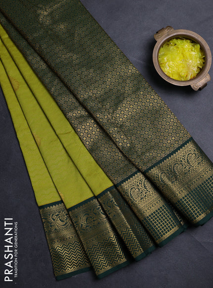 Semi kanchipuram silk saree light green and green with allover zari weaves & buttas and zari woven border